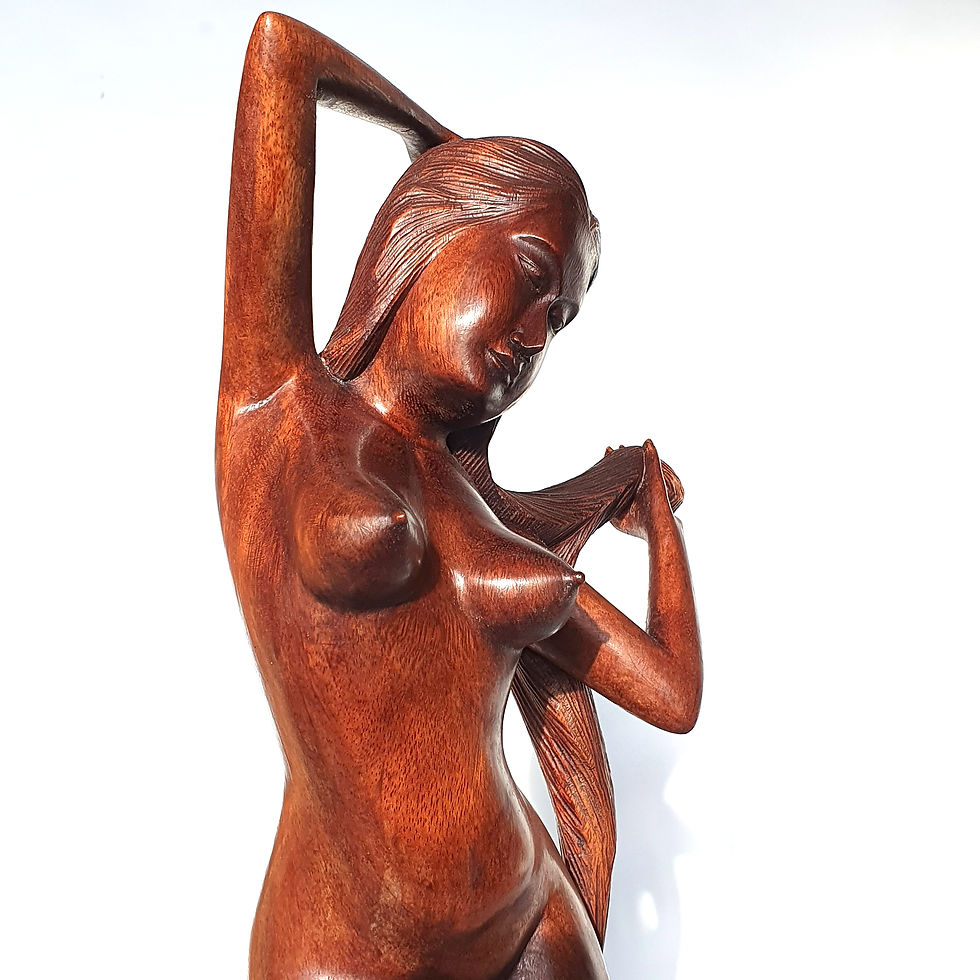 Thumbnail: Naked girl carved on wood