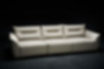 Cream colored  3 seater sofa side view