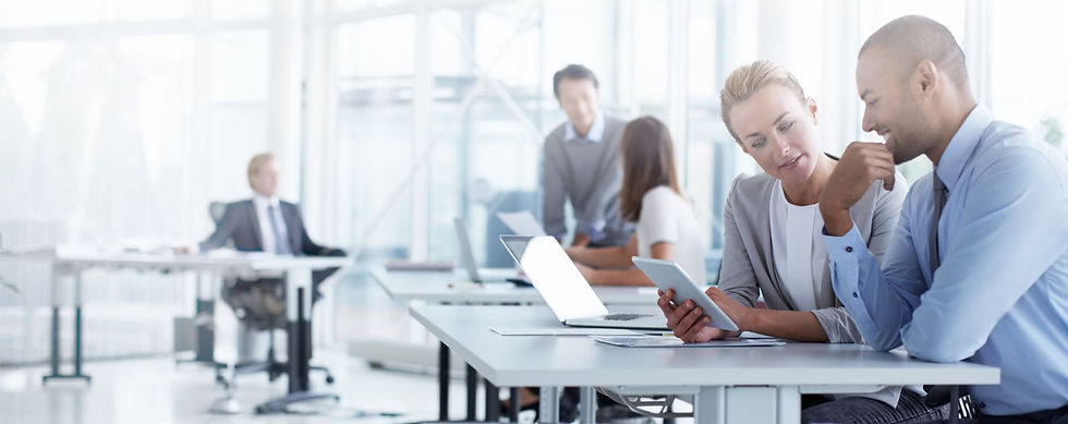 A group of people on their laptops sharing their thoughts and ideas