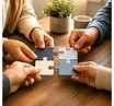 AI hands with puzzle pieces_edited.jpg