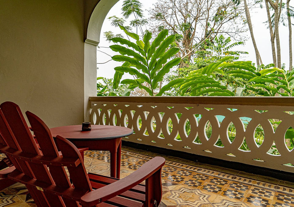 Tropical balcony view with chairs