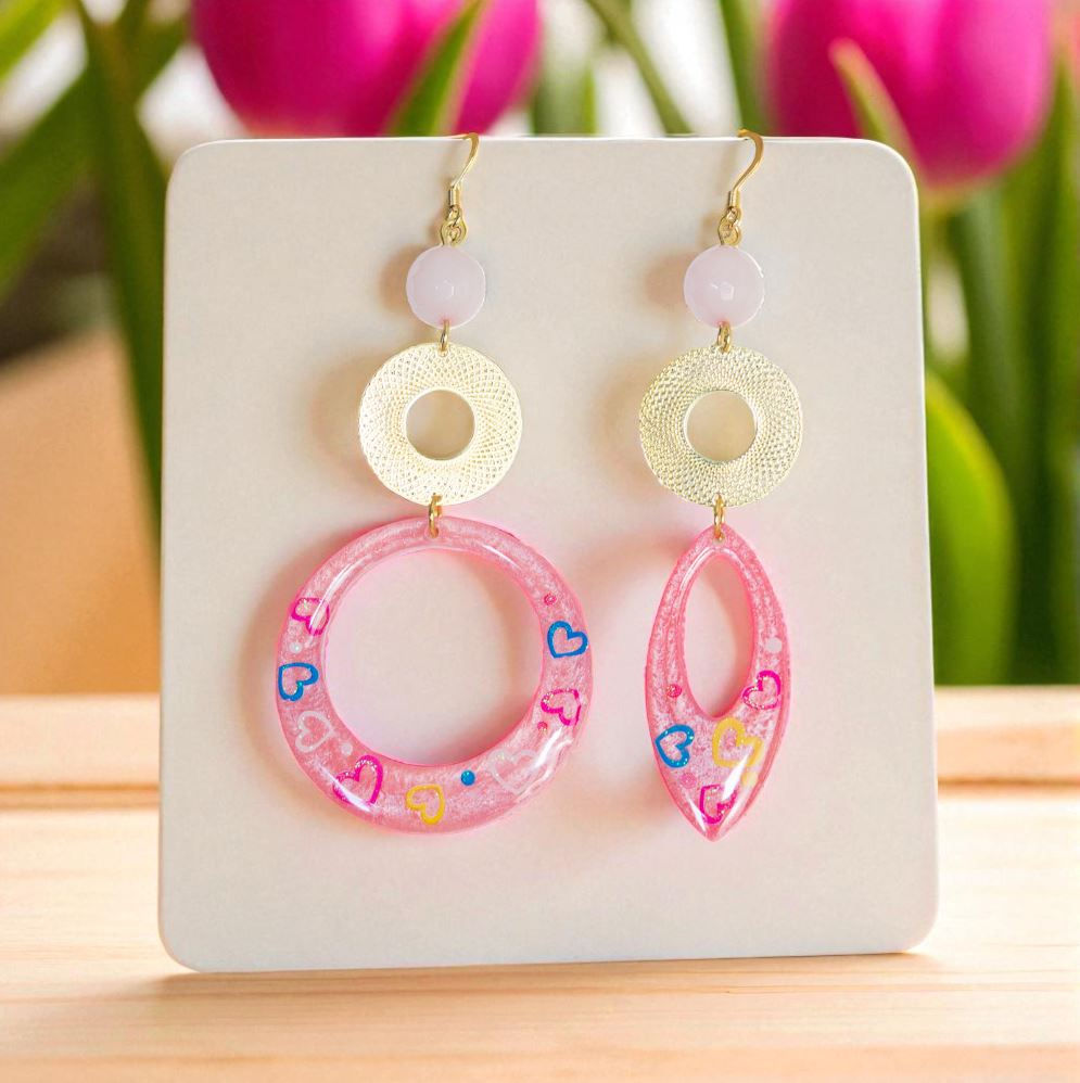 Boucles d'oreilles asymétrique quartz rose et pendentifs cœurs