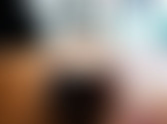 A latte in a coffee mug.