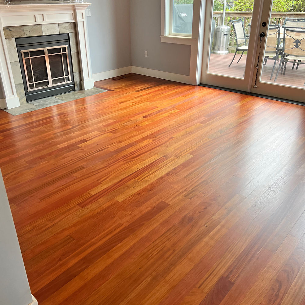 Refinished hardwood flooring in a living room