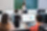 multiracial-students-using-computers-during-busine-2023-11-27-05-23-00-utc.jpg