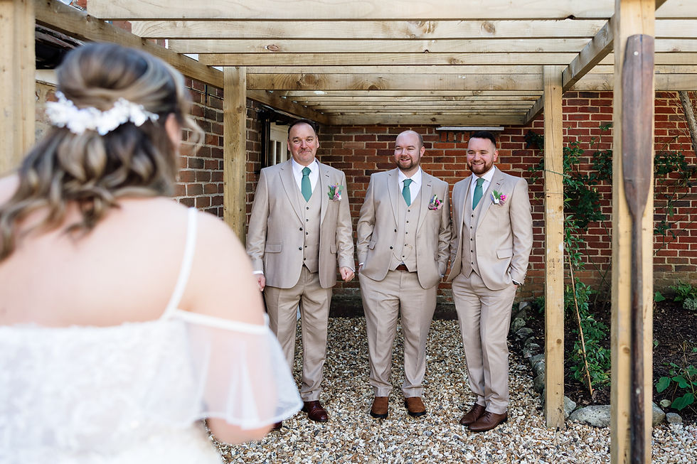 Bride and her father and  brothers during first look