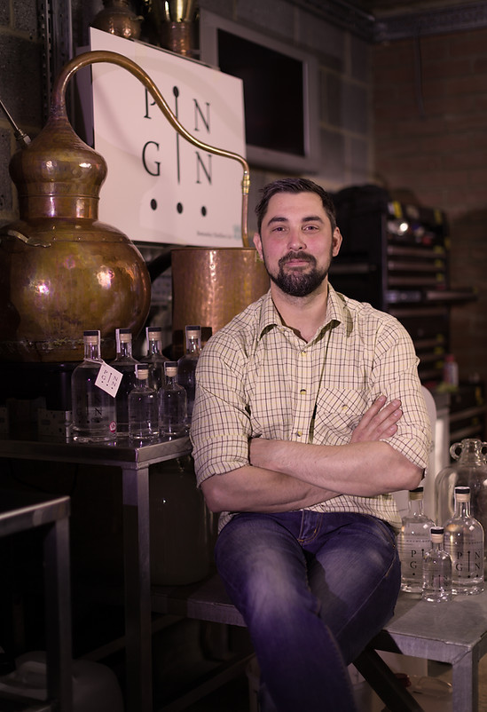 Pin Gin co-founder, Alan, in the first distillery set up in the garage