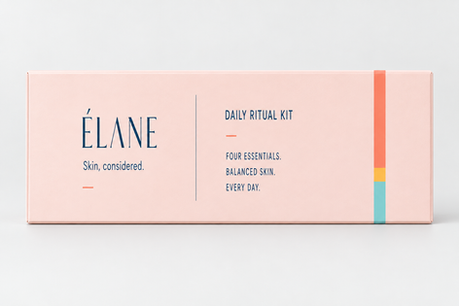 Closed ÉLANE Daily Ritual Kit in blush packaging with navy typography and coral, marigold, and aqua color accents.
