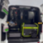 Mobile car detailing van setup with professional equipment for on-site services.