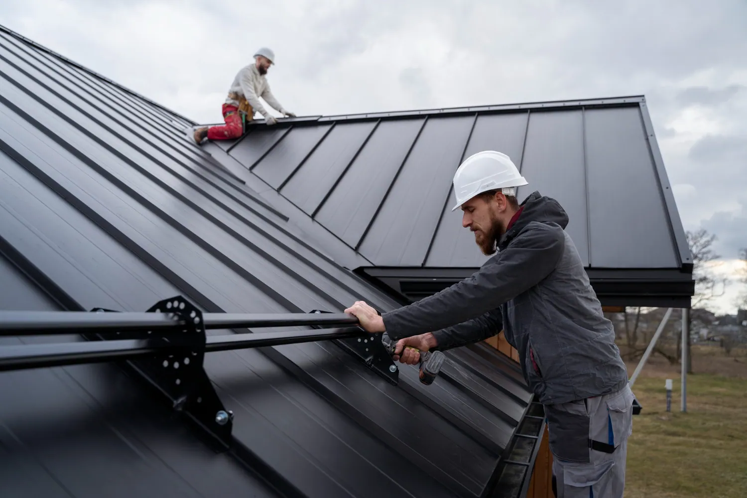 medium-shot-men-working-roof-together.webp