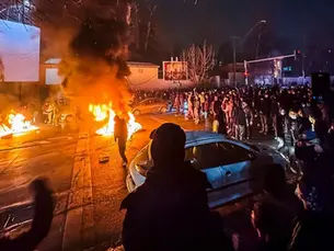 Iran Warns it Will Retaliate if US Attacks as Protesters Defy Crackdown