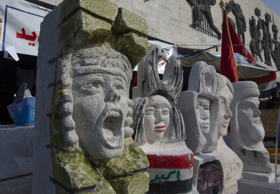 Iraqi artists pay tribute to dead protesters with sculptures