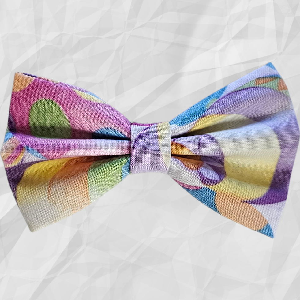 Easter bow tie with multicolored eggs of pastel shades on fabric