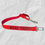 Thumbnail: Red Seat Belt Safety Strap embroidered with Road Trip in black