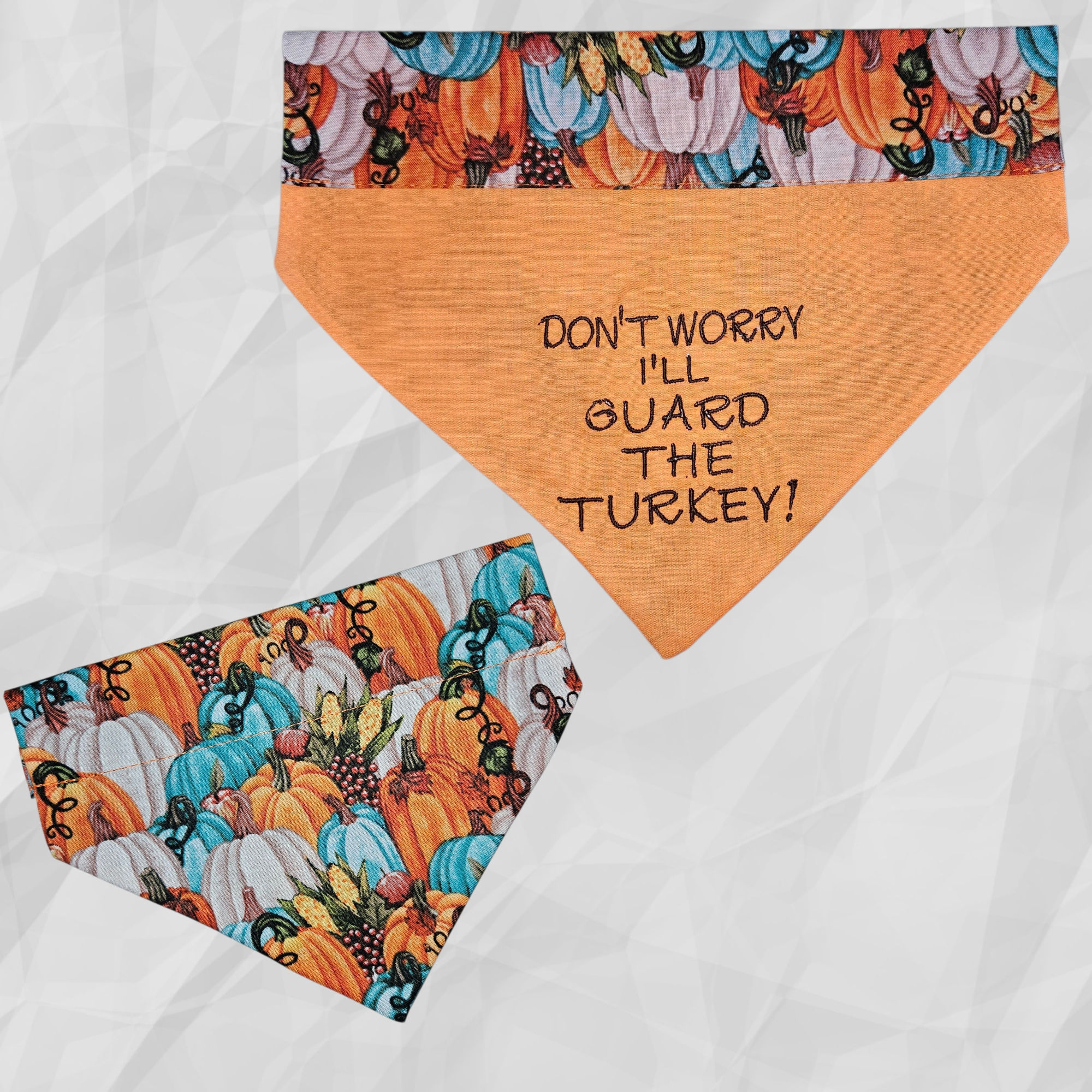 Over the Collar Bandana with a fall pumpkin fabric & orange solid embroidered with Don't Worry I'll Guard the Turkey!