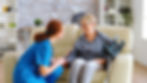 female-nurse-talking-with-old-woman-with-alzheimer-nursing-home.jpg