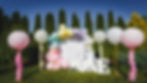 Photo zone in pink white style with paper stars, balloons, large, voluminous paper figure