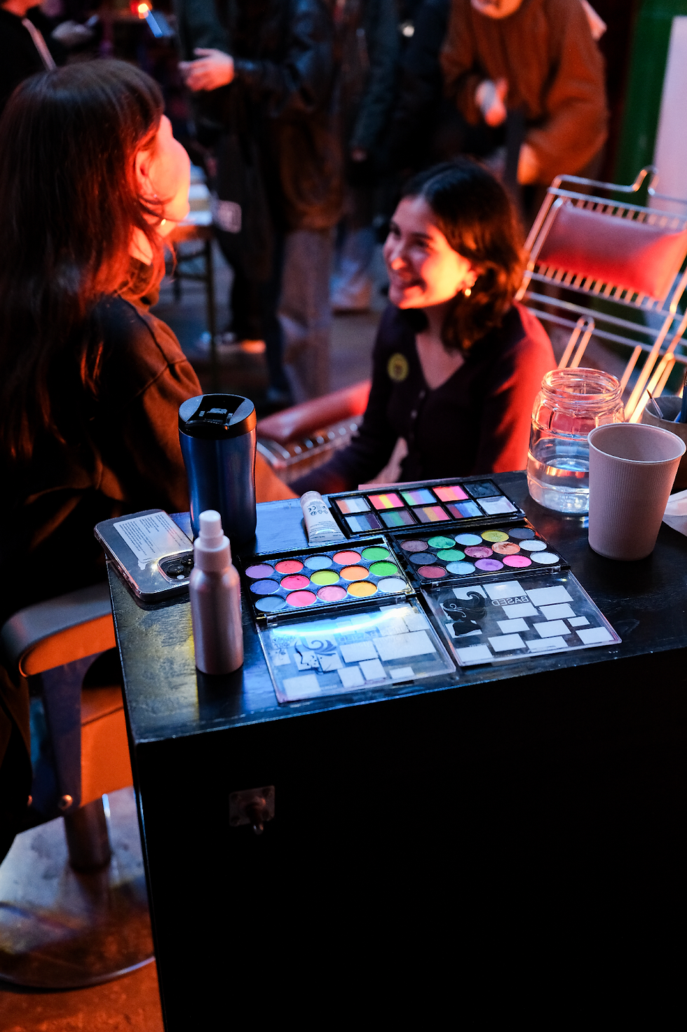 Valentina, the make-up artist and Mia, an organizer. Photograph by Camiel van der Heijden.