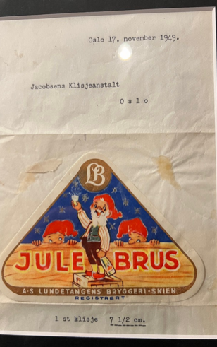 Originalt brev fra Jacobsens klisjeanstalt i Oslo med vedlagt etikett for Lundetangen julebrus. 