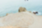 a relaxing labyrinth of beach rocks on the side of the seashore