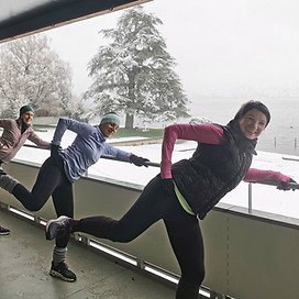 A diverse group of women engaging in a balcony workout session, demonstrating their commitment to physical fitness