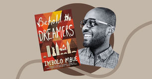 Book cover of "Behold the Dreamers" by Imbolo Mbue beside a smiling man in glasses. Beige background with abstract patterns.