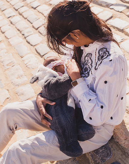 Prarthana Rao holding a baby