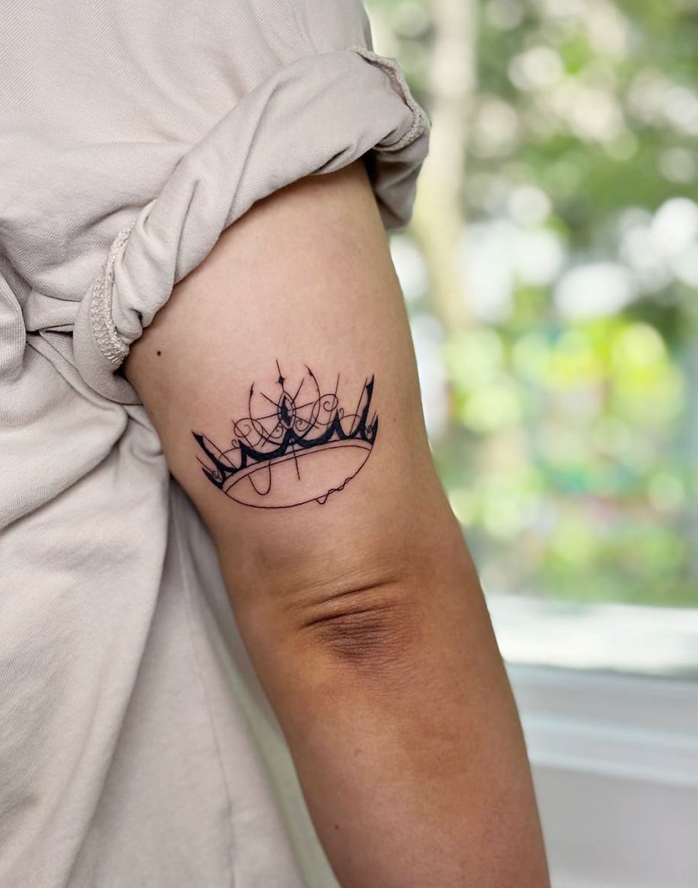 Best fineline crown tattoo in Toronto