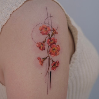 Small flower tattoo