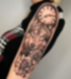 Half sleeve wolf tattoo