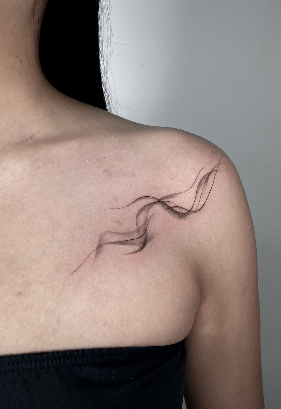 Best fine-line smoke tattoo in Toronto