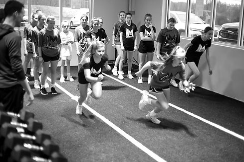 youth athletes working and speed and agility training at excelsior sports performance