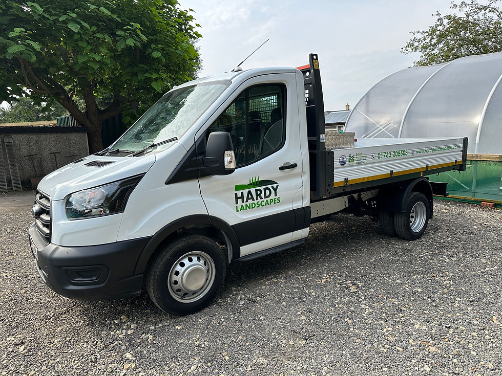 Hardy Landscapes truck with vehicle graphics branding seen in Cambridge