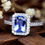 Thumbnail: Cushion-Cut Blue Sapphire and Diamond Halo Ring – 1.44 TCW