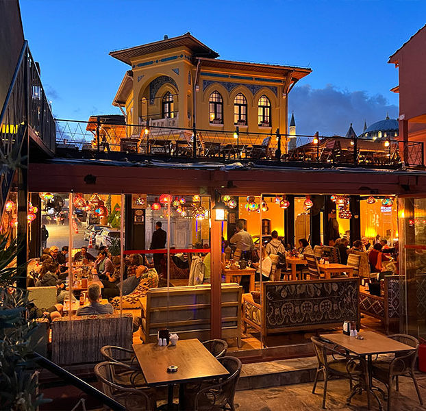 Palatium Cafe and Restaurant exterior and dining terrace in Sultanahmet Istanbul at evening