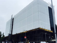 Shrink wrap installation service in the UK, enclosing scaffolded buildings for safety
