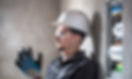 man-electrical-technician-working-switchboard-with-fuses-installation-connection-electrica