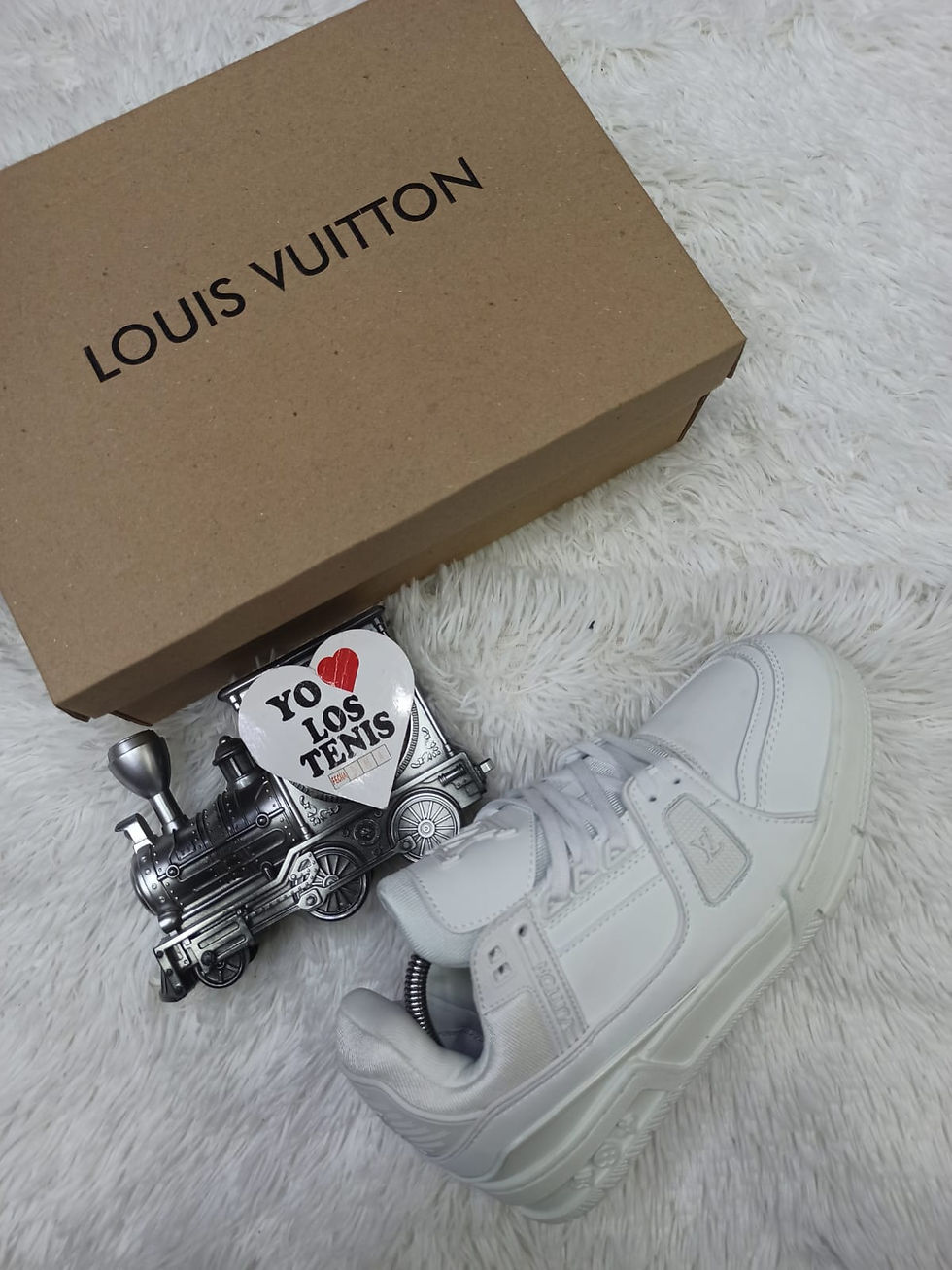 Miniatura: LOUIS VUITTON.