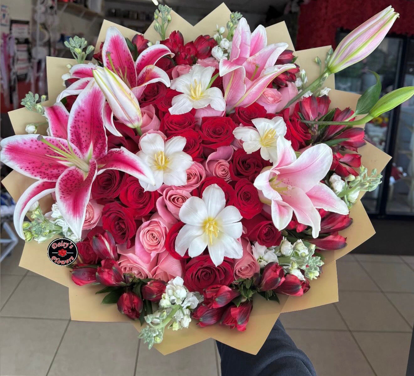 Mixed blooms with tulips and roses