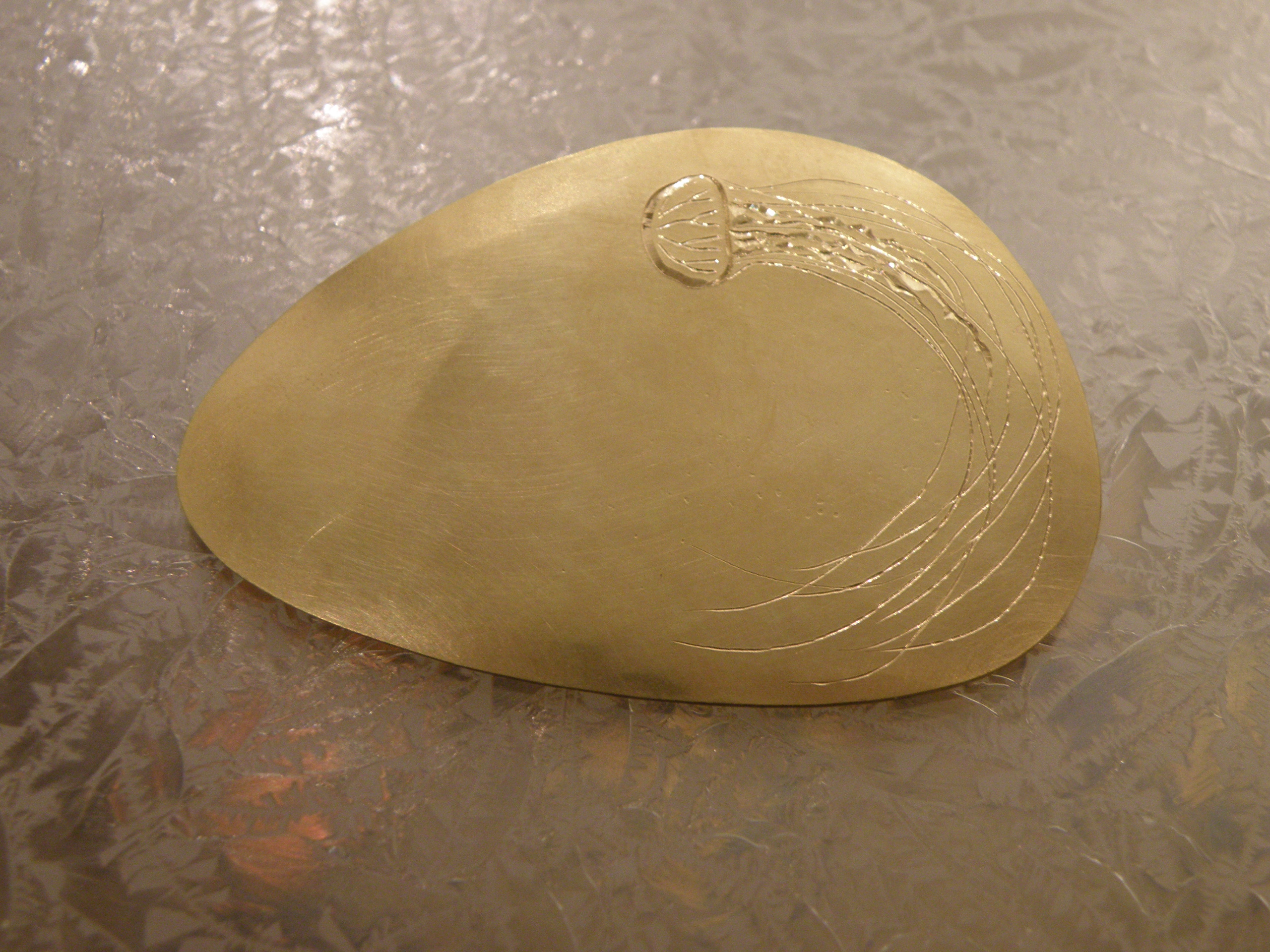 engraved broach