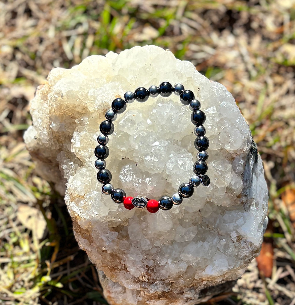 Sealed with a Kiss is a bracelet made with Silver and magnet Beads with a tiny set of silver lips!  6.7" by Joveli Designs