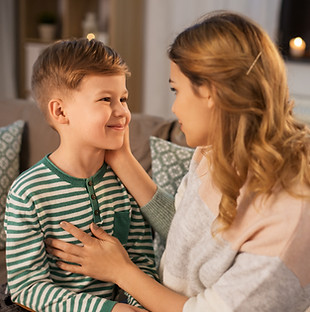 happy-smiling-mother-talking-her-son-home.jpg