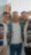 medium-shot-young-men-posing-together.jpg