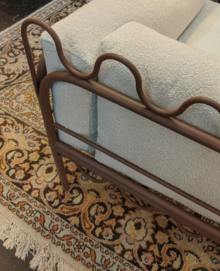 patterned rug curved frame textured chair
