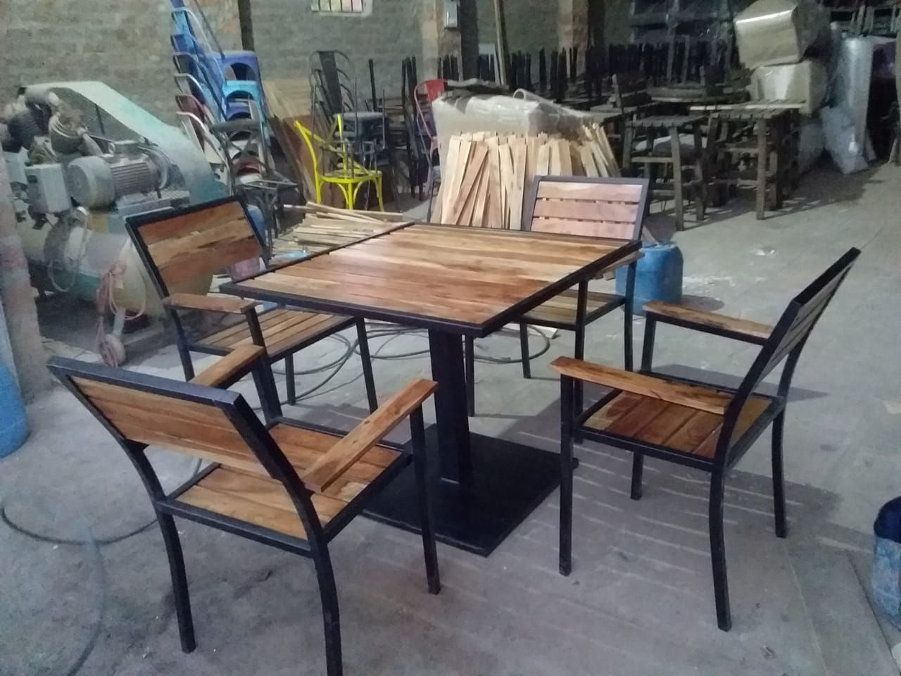Outdoor restaurant table with strip wood chair