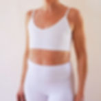 Thumbnail: the busted tank modal simple plunge pocketed mastectomy bra white shown worn flat