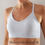 Thumbnail: the busted tank organic cotton pocketed mastectomy bra heather gray worn with breast forms