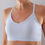 Thumbnail: the busted tank organic cotton pocketed mastectomy bra heather gray worn with breast forms