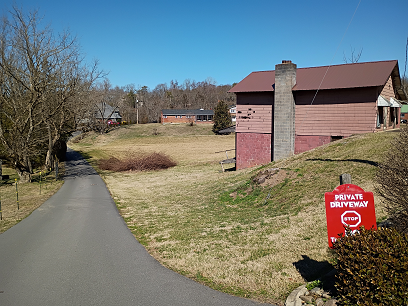 view from brick drive near house