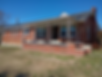 front of brick house